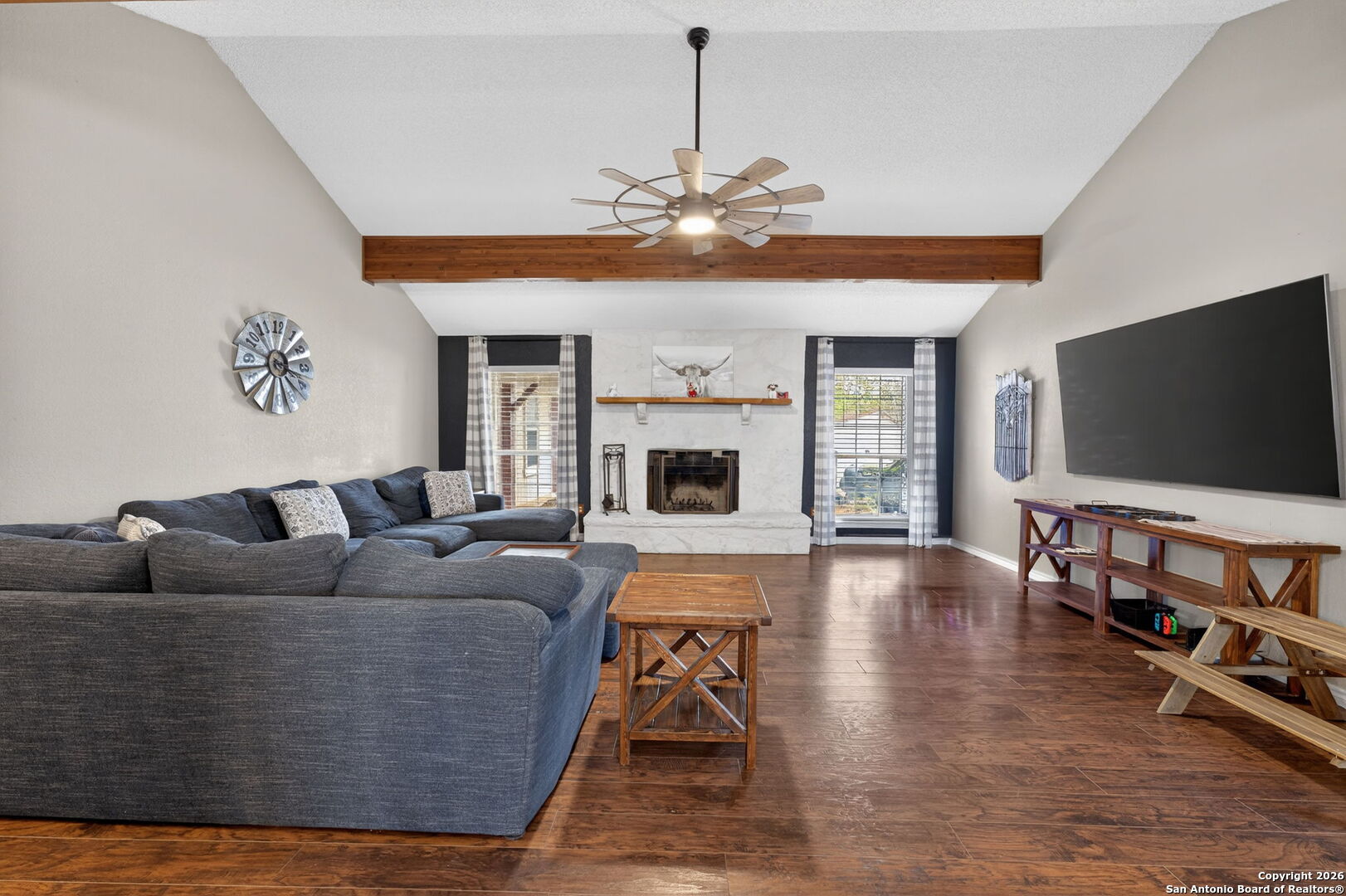 5 Cedar Ridge Road Boerne, TX 78006 - Photo 12 of 47 a living room with fireplace furniture and a flat screen tv