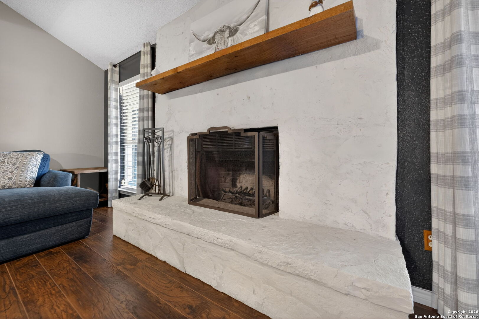 5 Cedar Ridge Road Boerne, TX 78006 - Photo 14 of 47 a living room with furniture and a fireplace