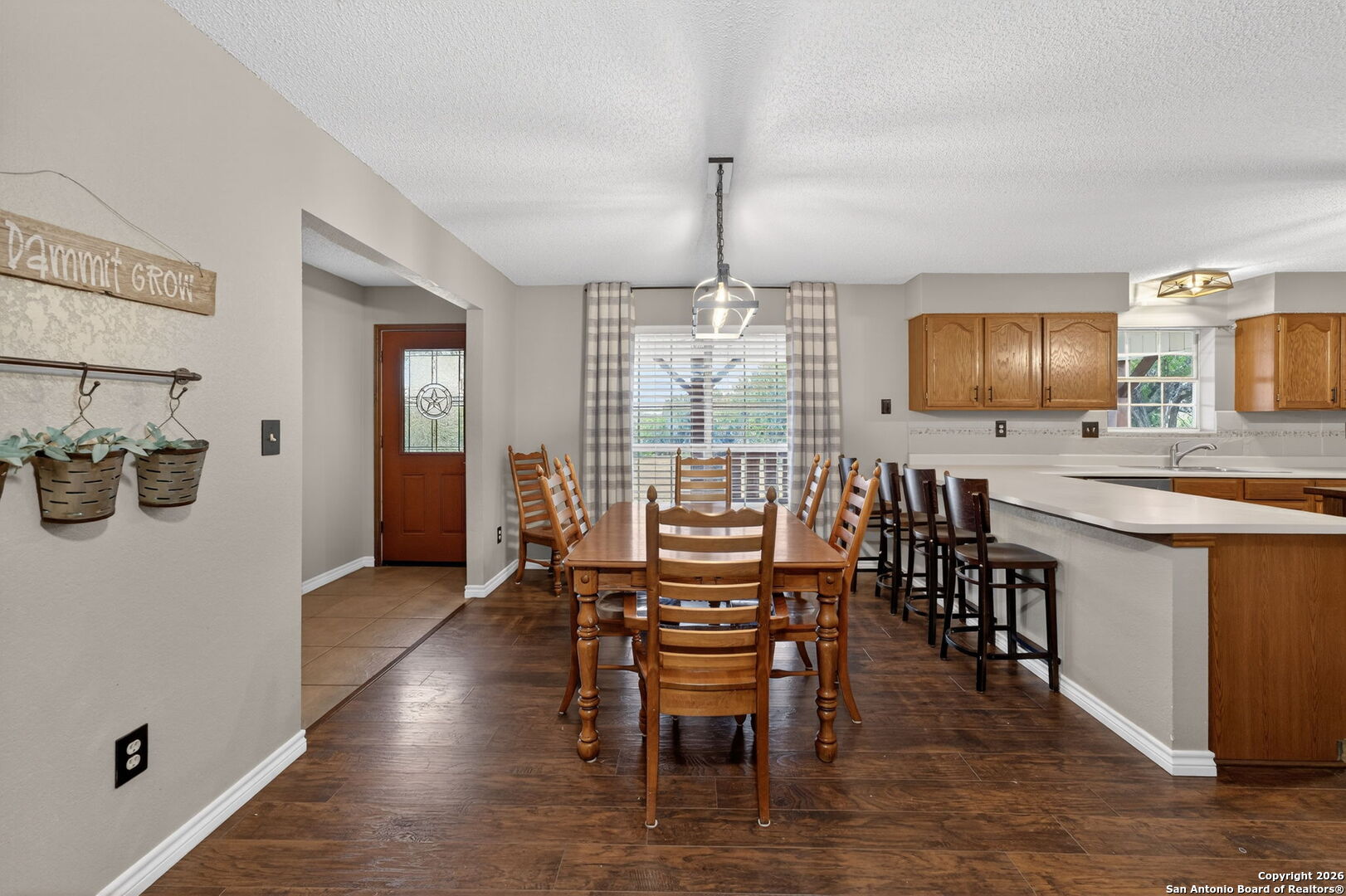 5 Cedar Ridge Road Boerne, TX 78006 - Photo 16 of 47 a view of a dining room with furniture window and wooden floor