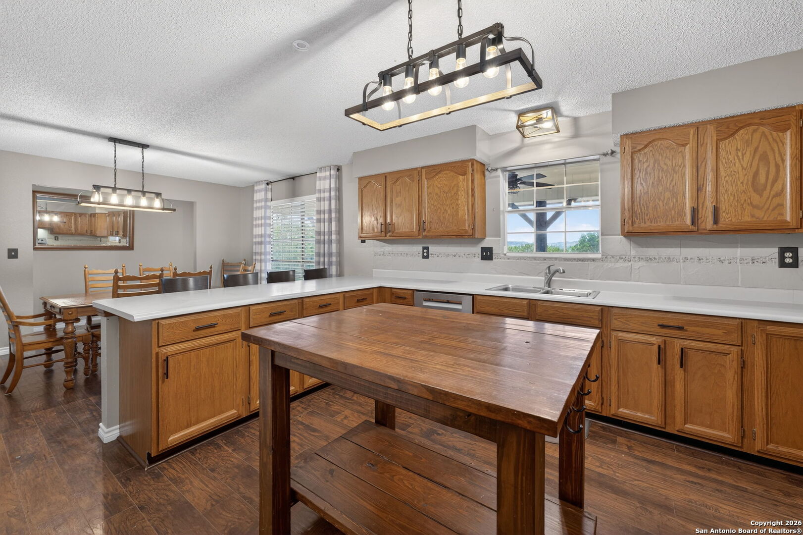 5 Cedar Ridge Road Boerne, TX 78006 - Photo 18 of 47 a kitchen with a sink cabinets and window