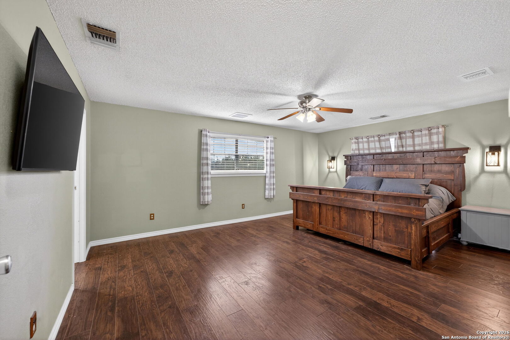 5 Cedar Ridge Road Boerne, TX 78006 - Photo 19 of 47 a bedroom with furniture and window