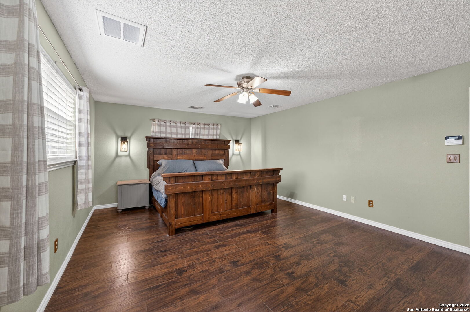 5 Cedar Ridge Road Boerne, TX 78006 - Photo 20 of 47 a bedroom with furniture and wooden floor