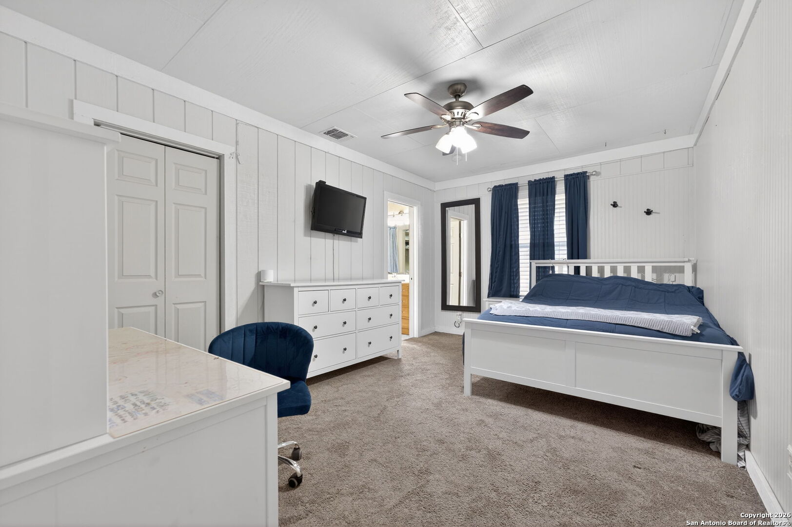 5 Cedar Ridge Road Boerne, TX 78006 - Photo 30 of 47 a living room with furniture and a flat screen tv