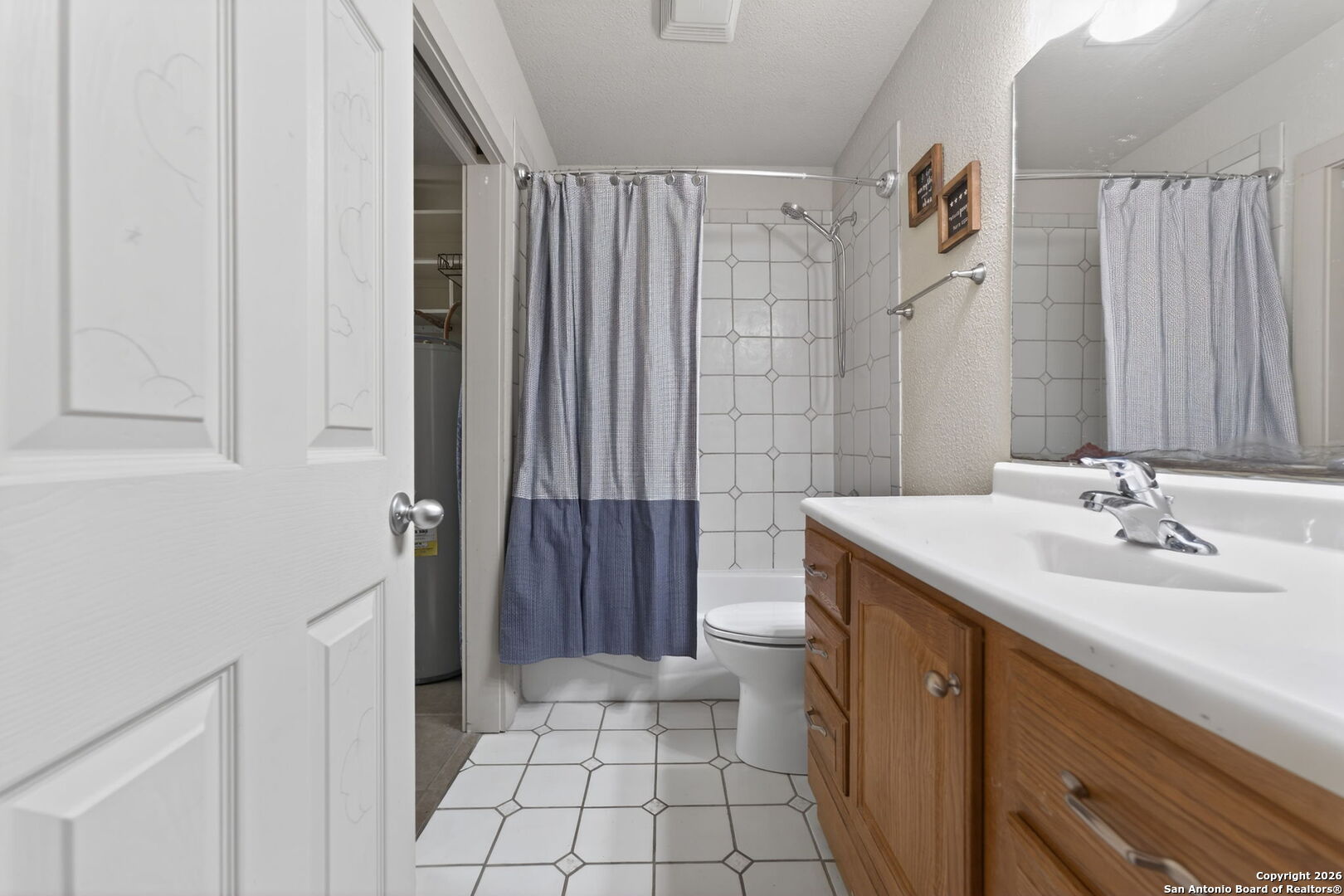 5 Cedar Ridge Road Boerne, TX 78006 - Photo 31 of 47 a bathroom with a sink a toilet and shower