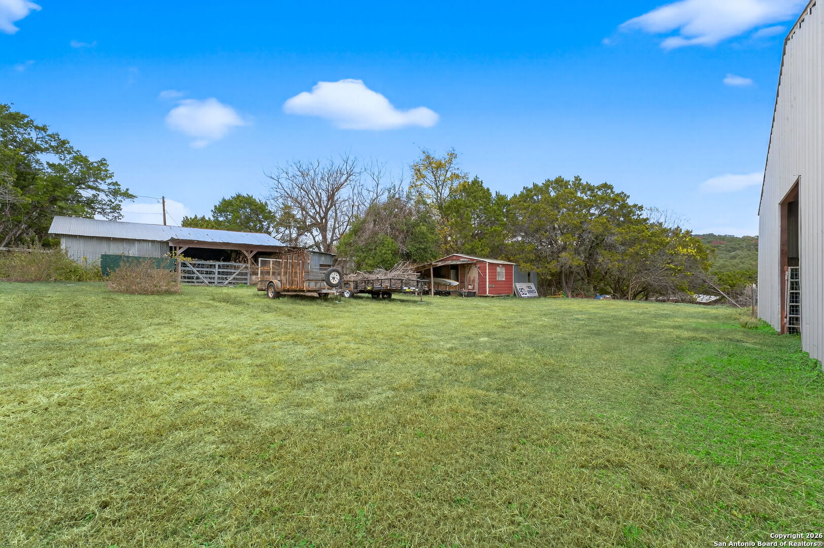 5 Cedar Ridge Road Boerne, TX 78006 - Photo 44 of 47 a front view of a house with a garden and yard