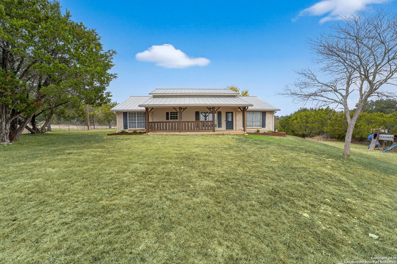 5 Cedar Ridge Road Boerne, TX 78006 - Photo 5 of 47 a view of a house with a yard