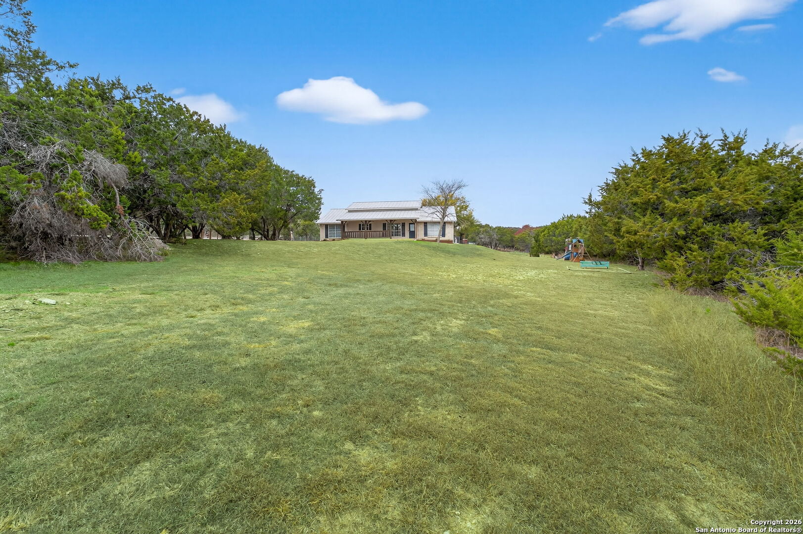 5 Cedar Ridge Road Boerne, TX 78006 - Photo 7 of 47 a view of a field with an trees in the background