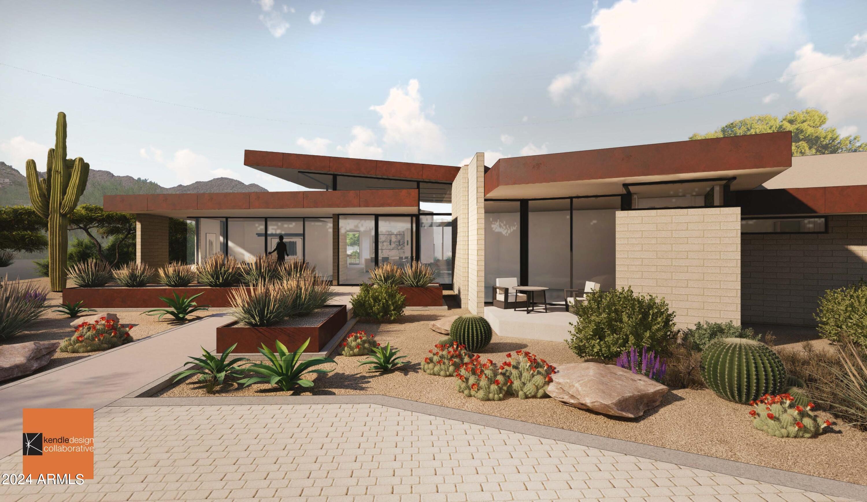 6612 East Hummingbird Lane Paradise Valley, AZ 85253 - Photo 1 of 16 a view of a house with backyard sitting area and porch