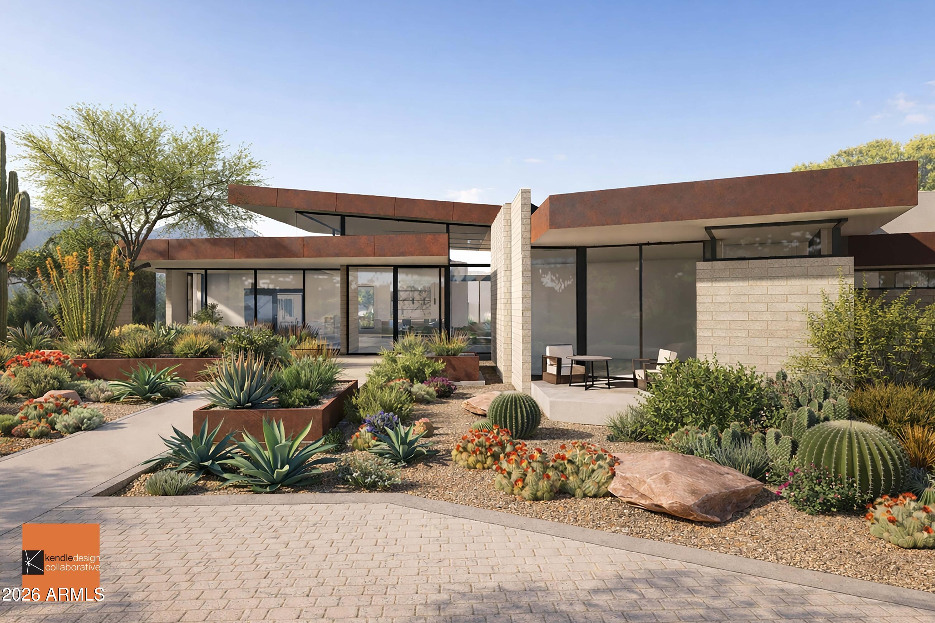6612 East Hummingbird Lane Paradise Valley, AZ 85253 - Photo 1 of 15 a view of a house with backyard and sitting area