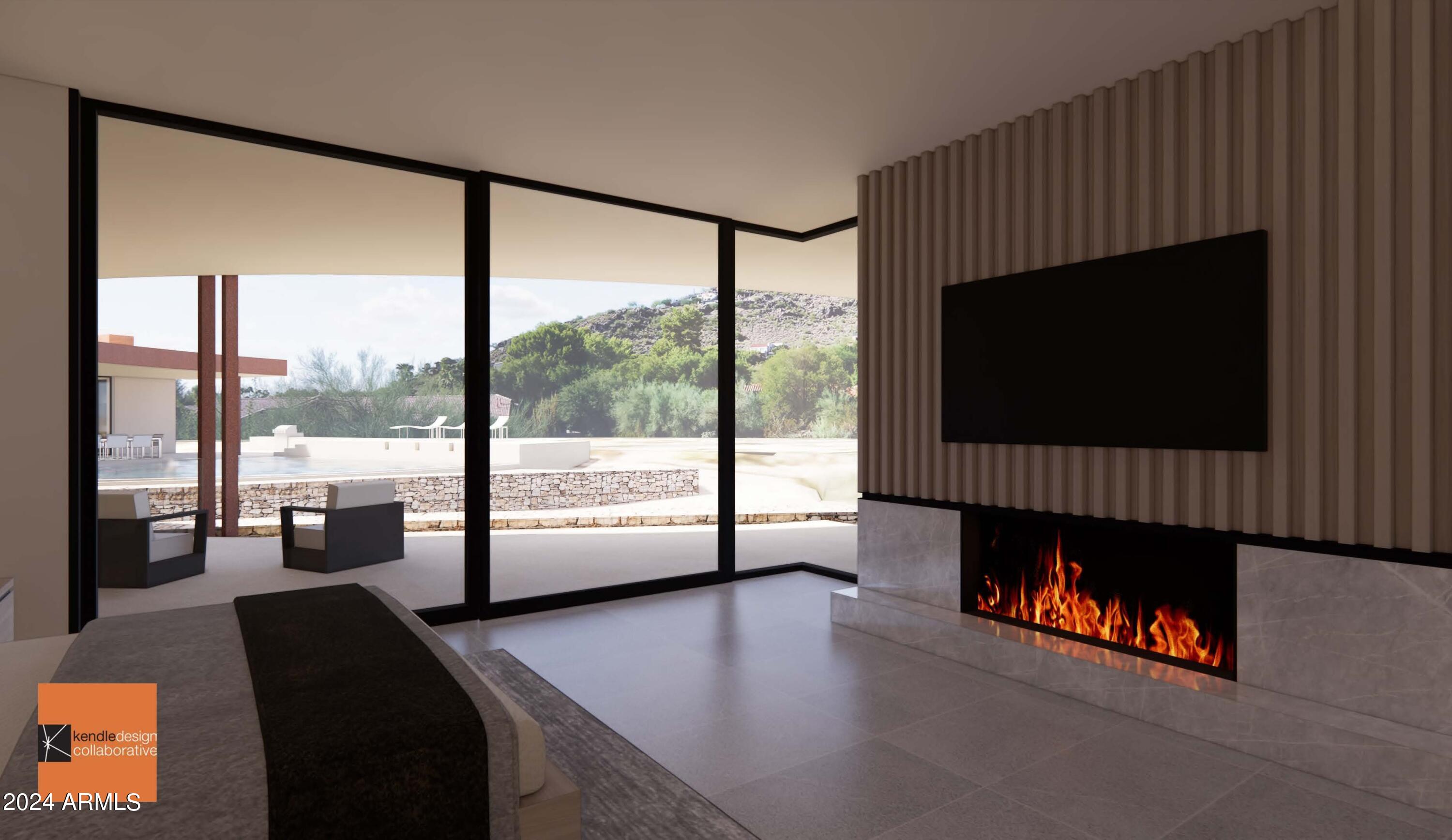 6612 East Hummingbird Lane Paradise Valley, AZ 85253 - Photo 14 of 16 a living room with a large window and a flat screen tv