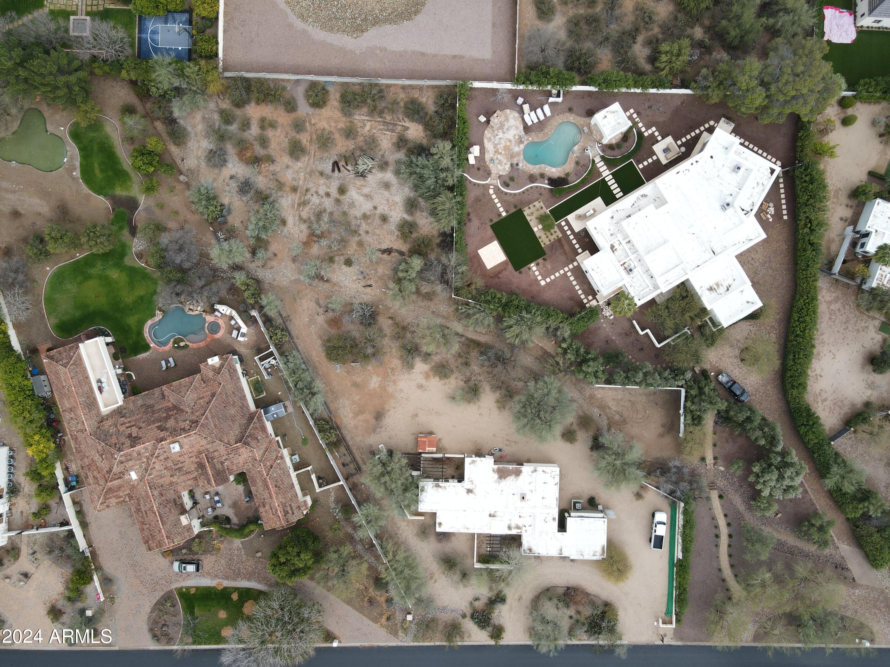 6612 East Hummingbird Lane Paradise Valley, AZ 85253 - Photo 16 of 16 an aerial view of a house with outdoor space