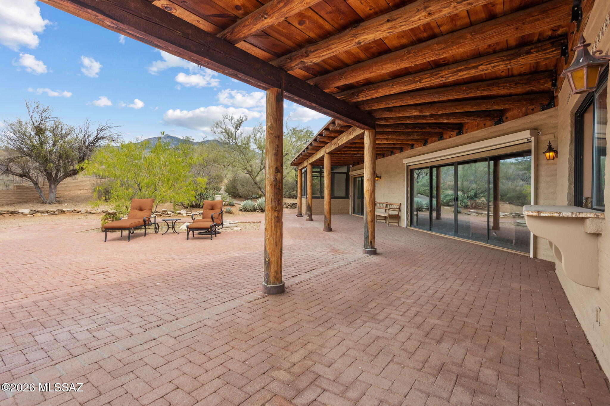 7171 South X9 Ranch Road Vail, AZ 85641 - Photo 43 of 50 Granite counter at kitchen window. Patio chaises negotiable.