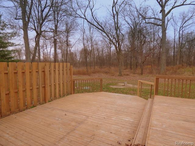 2220 Layton Road Fowlerville, MI 48836 - Photo 23 of 32 22 - 264-023171 DECK AND YARD 2.jpg