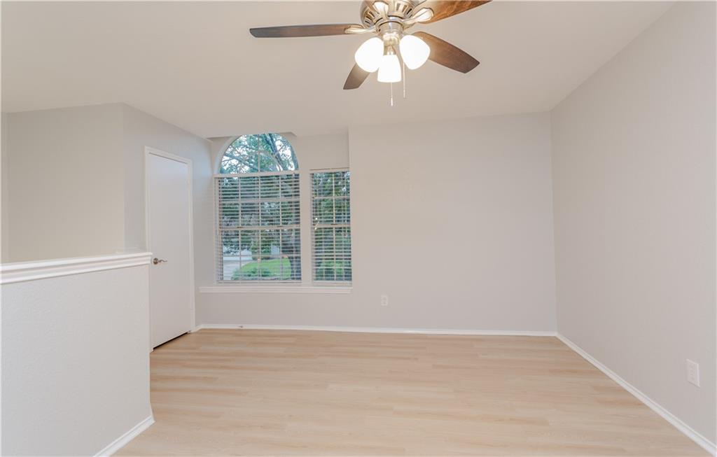 13207 Vendrell Drive Austin, TX 78729 - Photo 15 of 20 a view of an empty room with a window