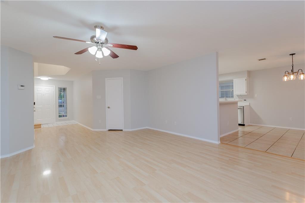 13207 Vendrell Drive Austin, TX 78729 - Photo 3 of 20 a view of an empty room with a window