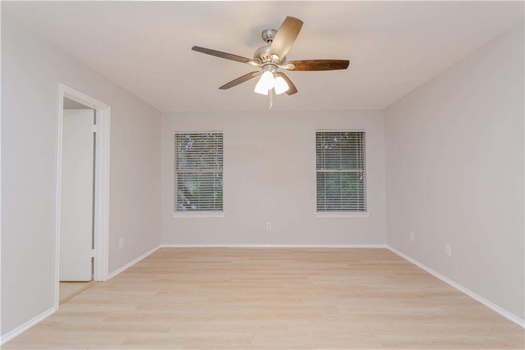 13207 Vendrell Drive Austin, TX 78729 - Photo 10 of 20 a view of an empty room with a window