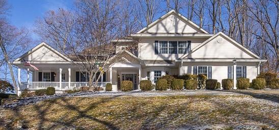 View of front of property with a porch