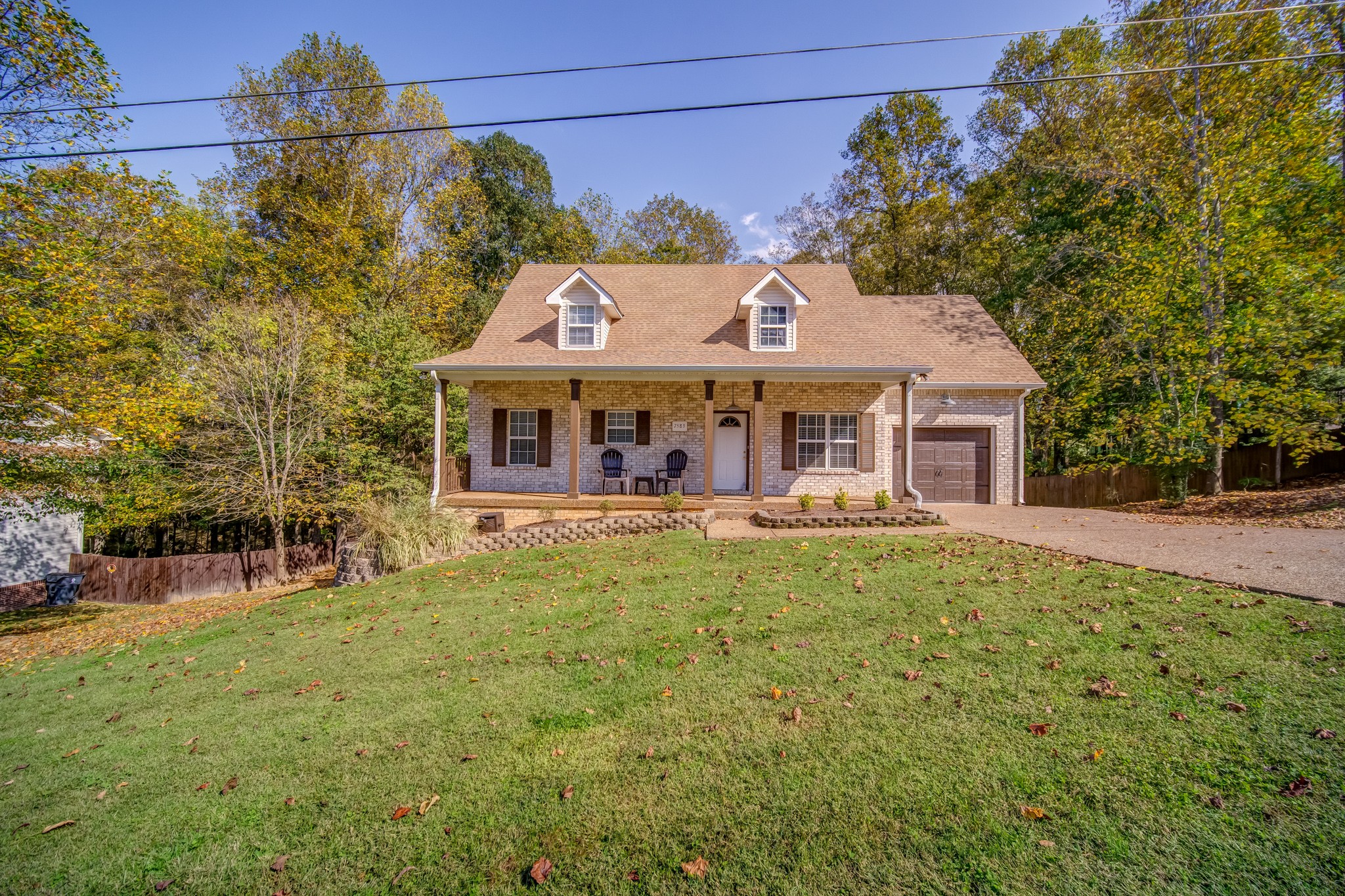 7583 Cherokee Hills Road Fairview, TN 37062 - Photo 2 of 50 a view of a house with a swimming pool