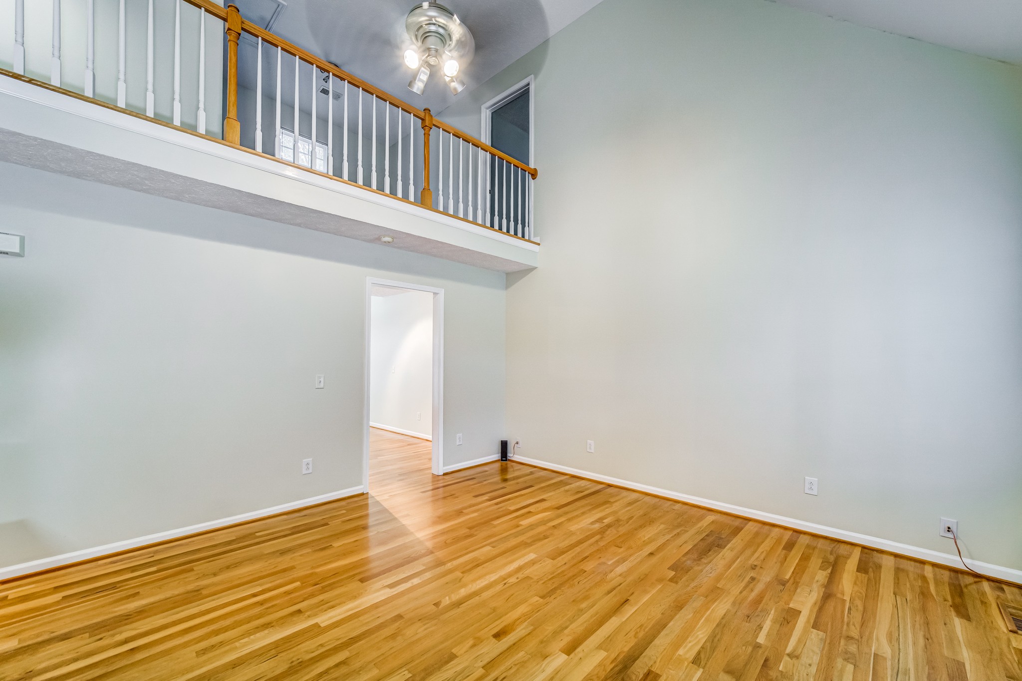 7583 Cherokee Hills Road Fairview, TN 37062 - Photo 16 of 50 a view of an empty room with wooden floor