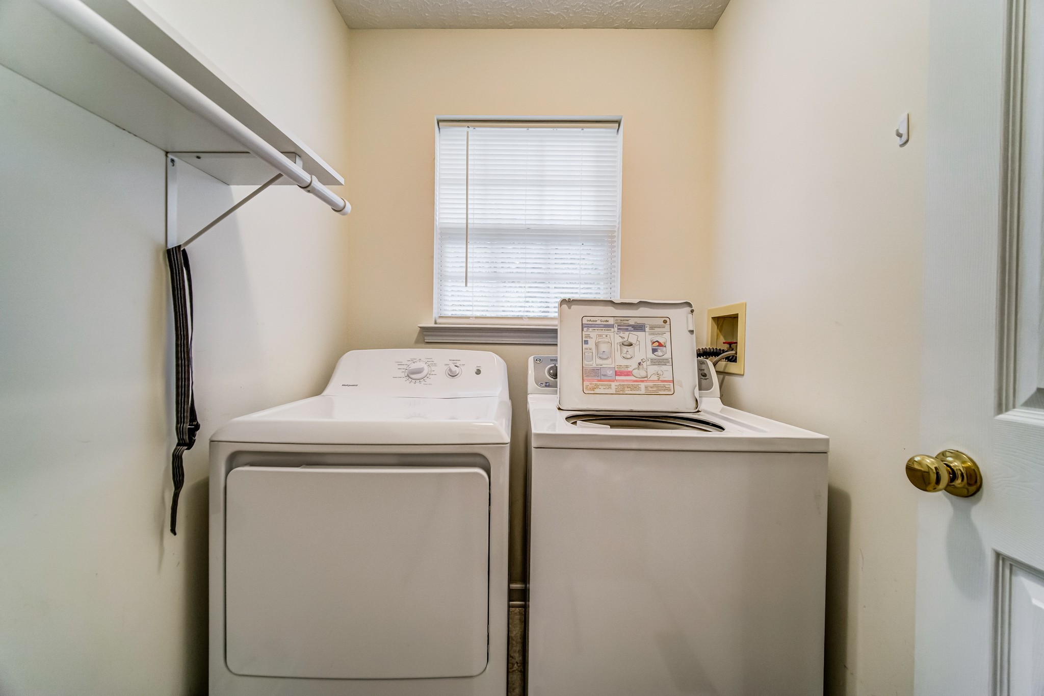 7583 Cherokee Hills Road Fairview, TN 37062 - Photo 32 of 50 a utility room with dryer and washer