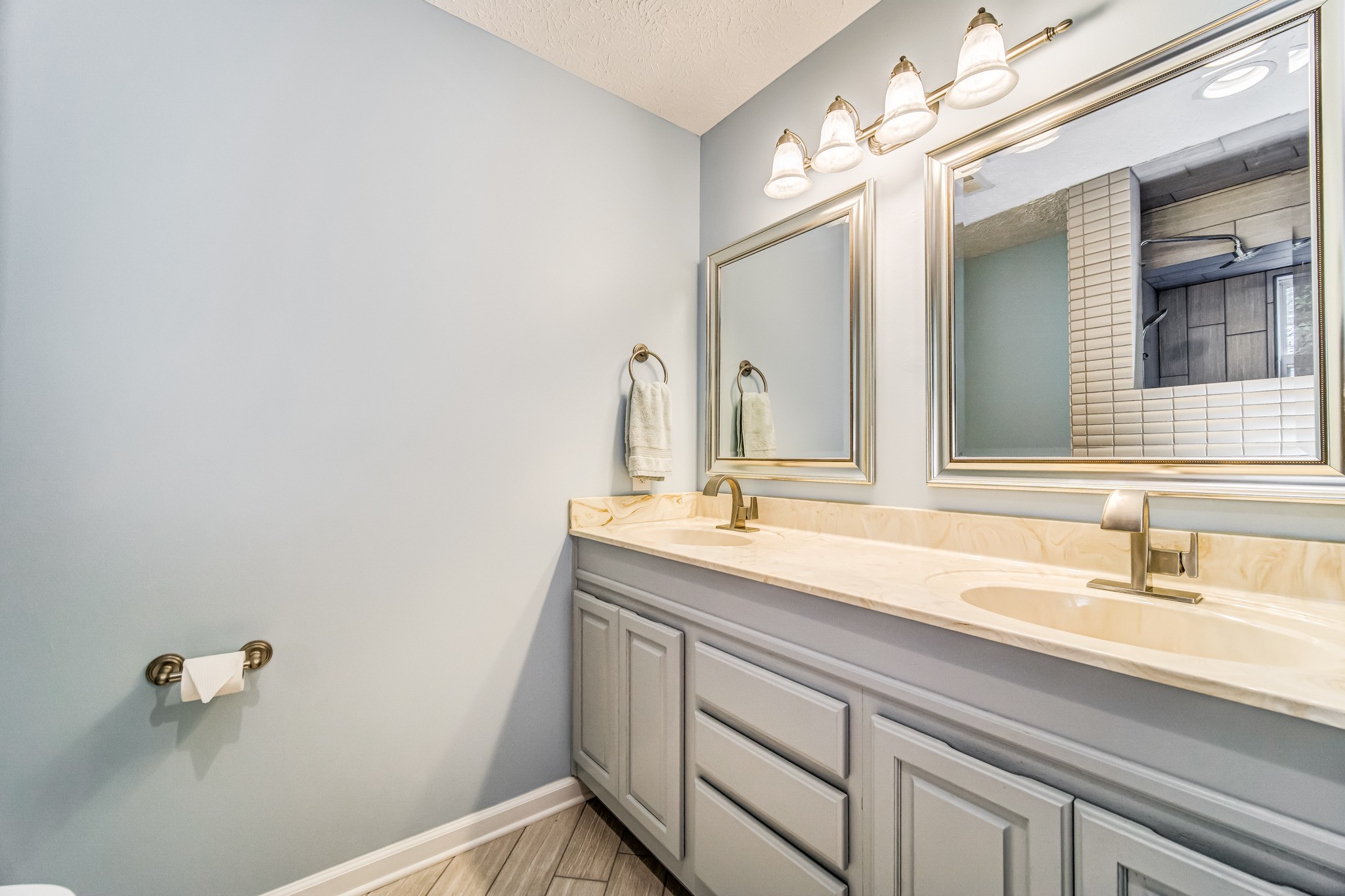 7583 Cherokee Hills Road Fairview, TN 37062 - Photo 37 of 50 a bathroom with a sink and a mirror