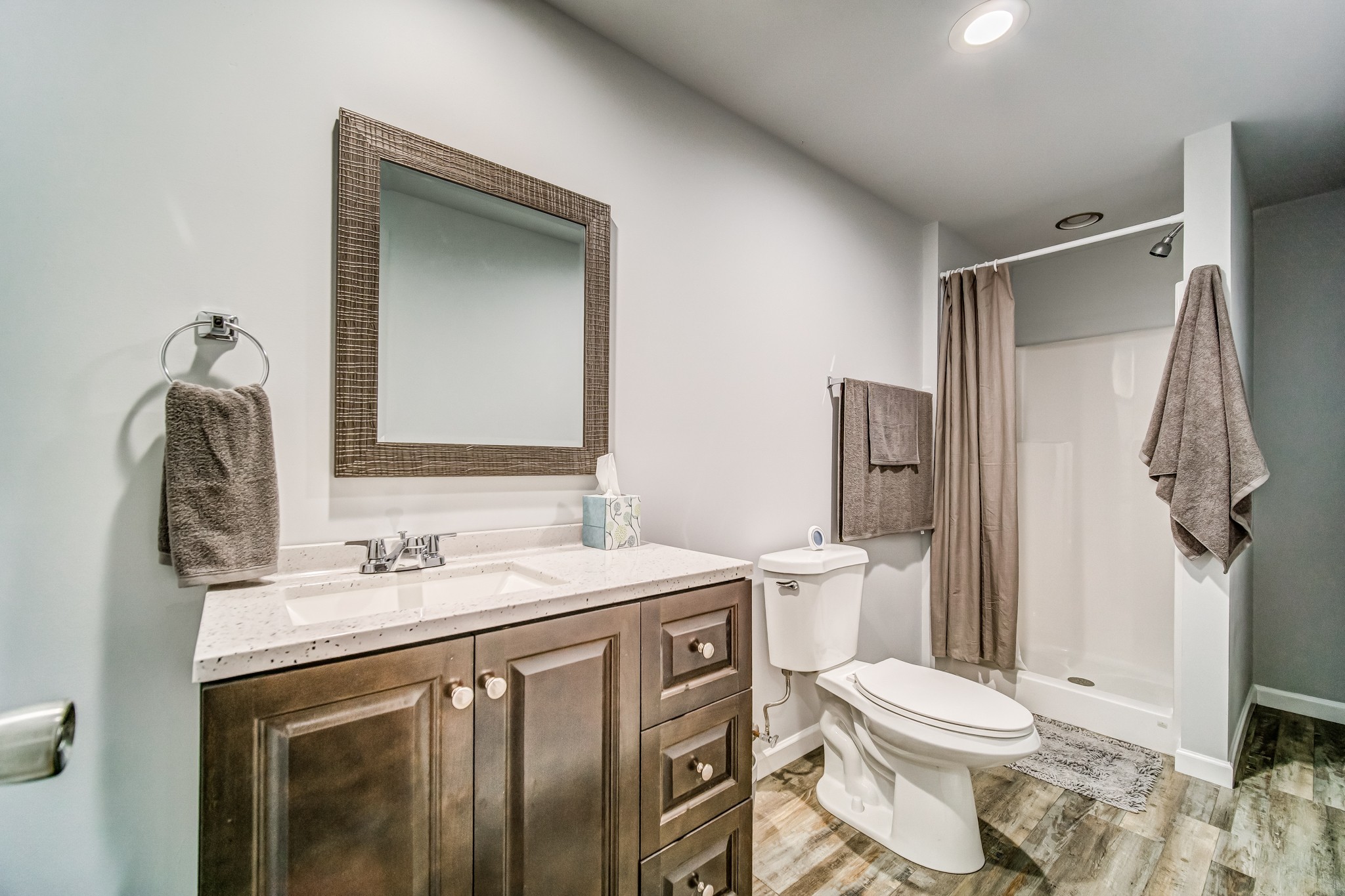 7583 Cherokee Hills Road Fairview, TN 37062 - Photo 47 of 50 a bathroom with a sink toilet vanity and shower