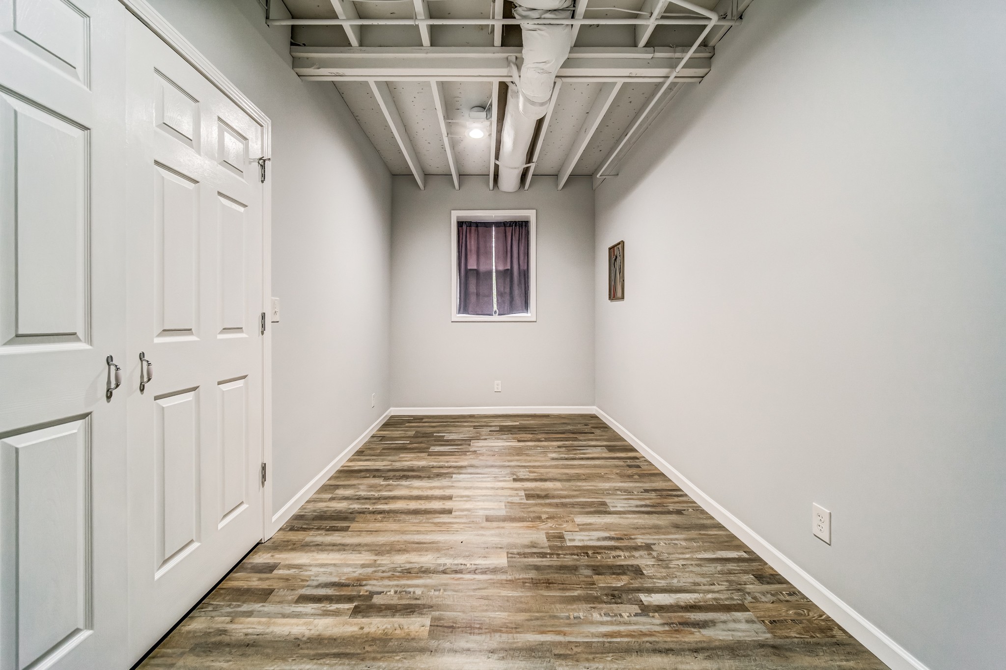 7583 Cherokee Hills Road Fairview, TN 37062 - Photo 50 of 50 a view of a hallway with wooden floor and staircase