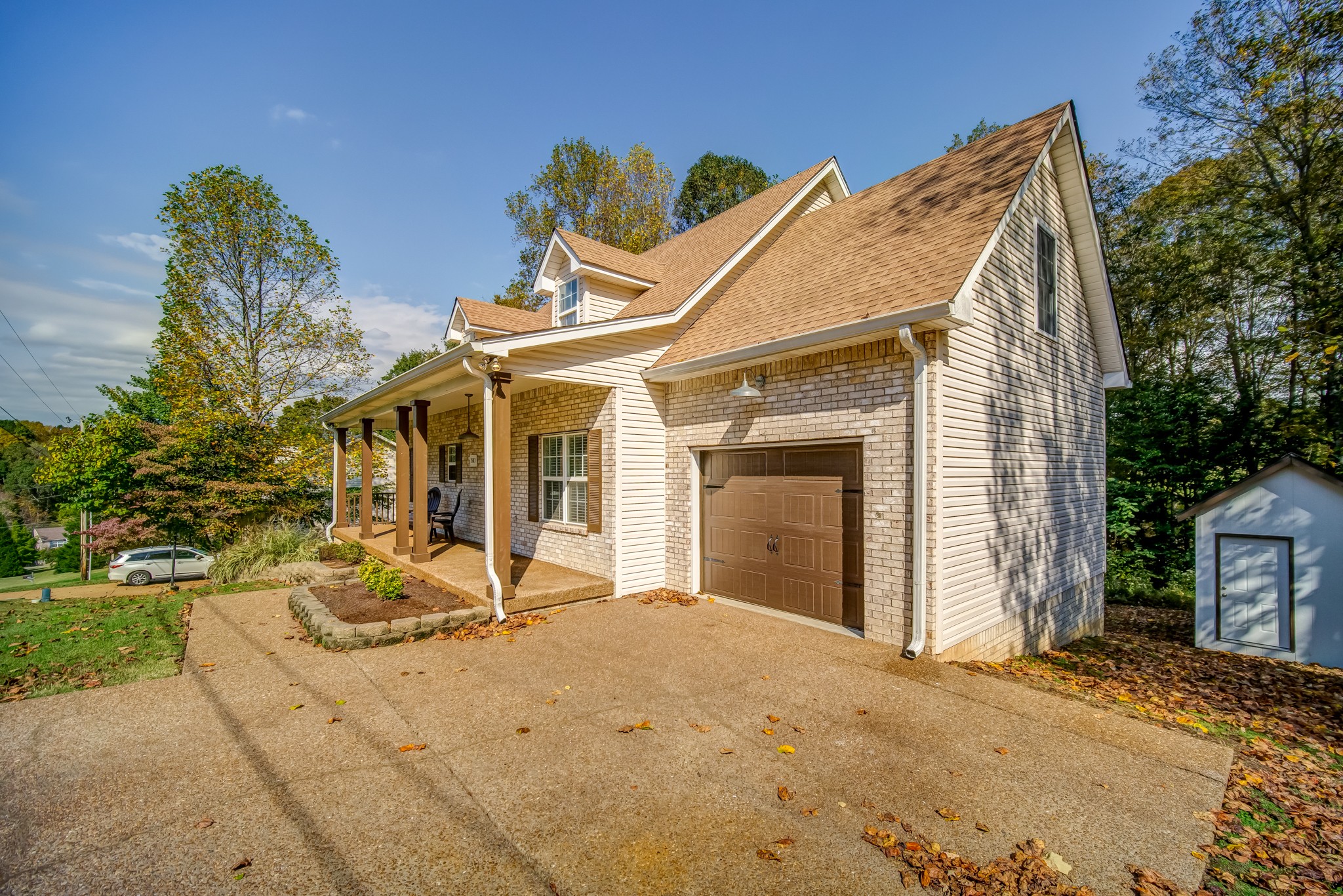 7583 Cherokee Hills Road Fairview, TN 37062 - Photo 6 of 50 a view of a house with backyard porch and sitting area