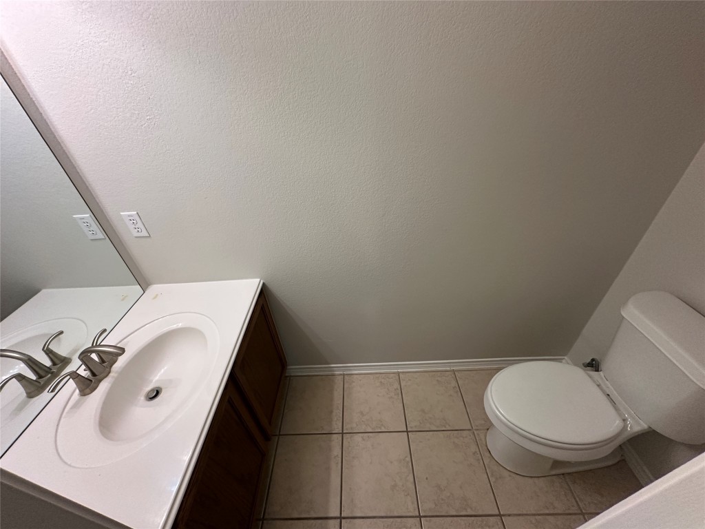 120 B Utterback Kyle, TX 78640 - Photo 16 of 24 a bathroom with a sink and toilet