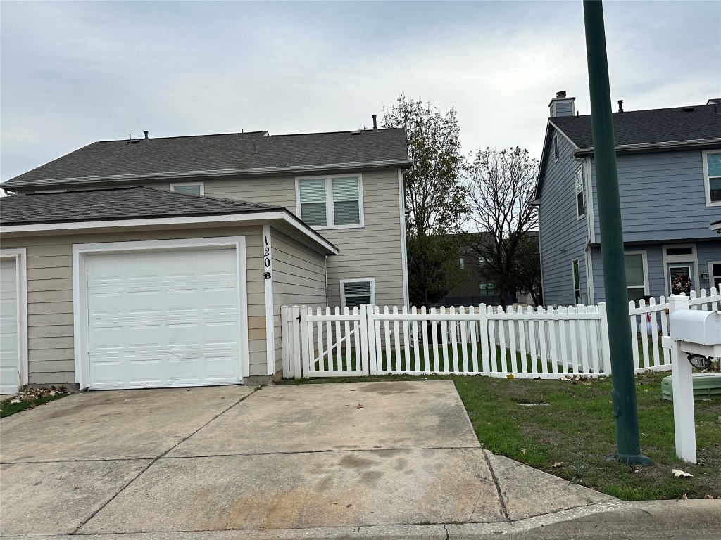 120 B Utterback Kyle, TX 78640 - Photo 24 of 24 a front view of a house having yard