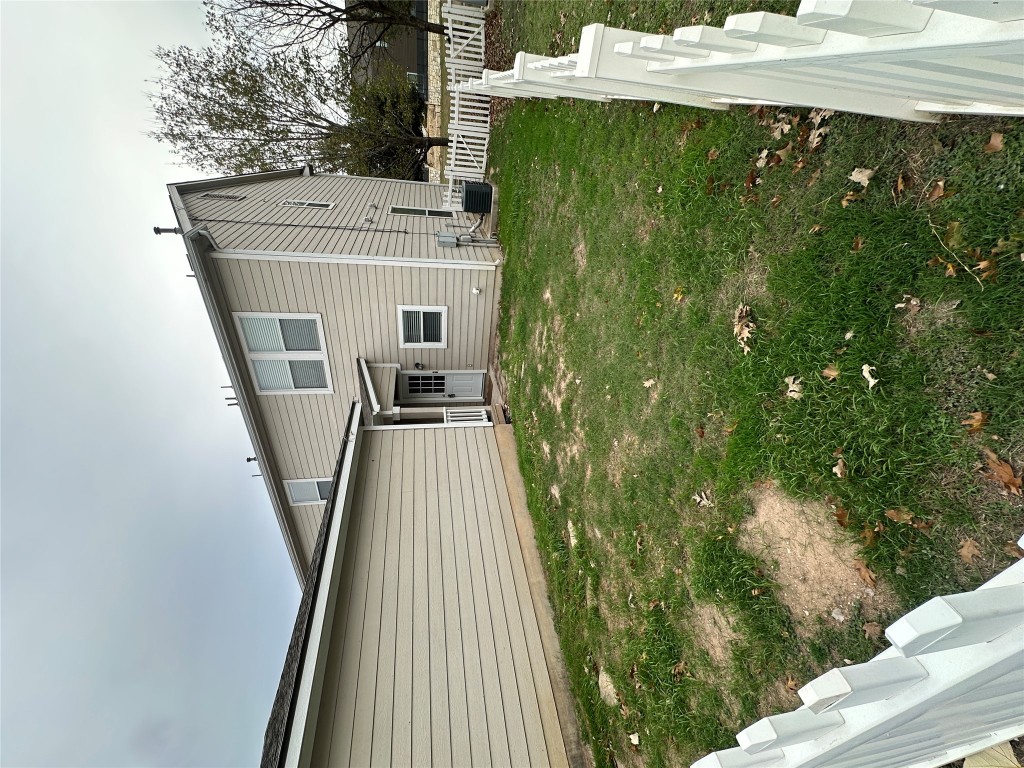 120 B Utterback Kyle, TX 78640 - Photo 4 of 24 a backyard of a house with plants and large tree