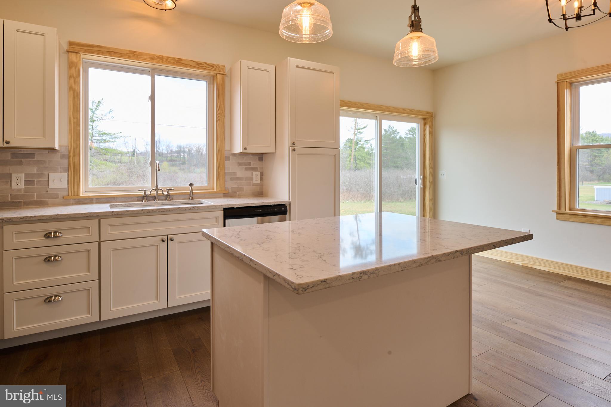 129 Lower Georges Valley Road Spring Mills, PA 16875 - Photo 11 of 61 a kitchen with a window a sink and cabinets
