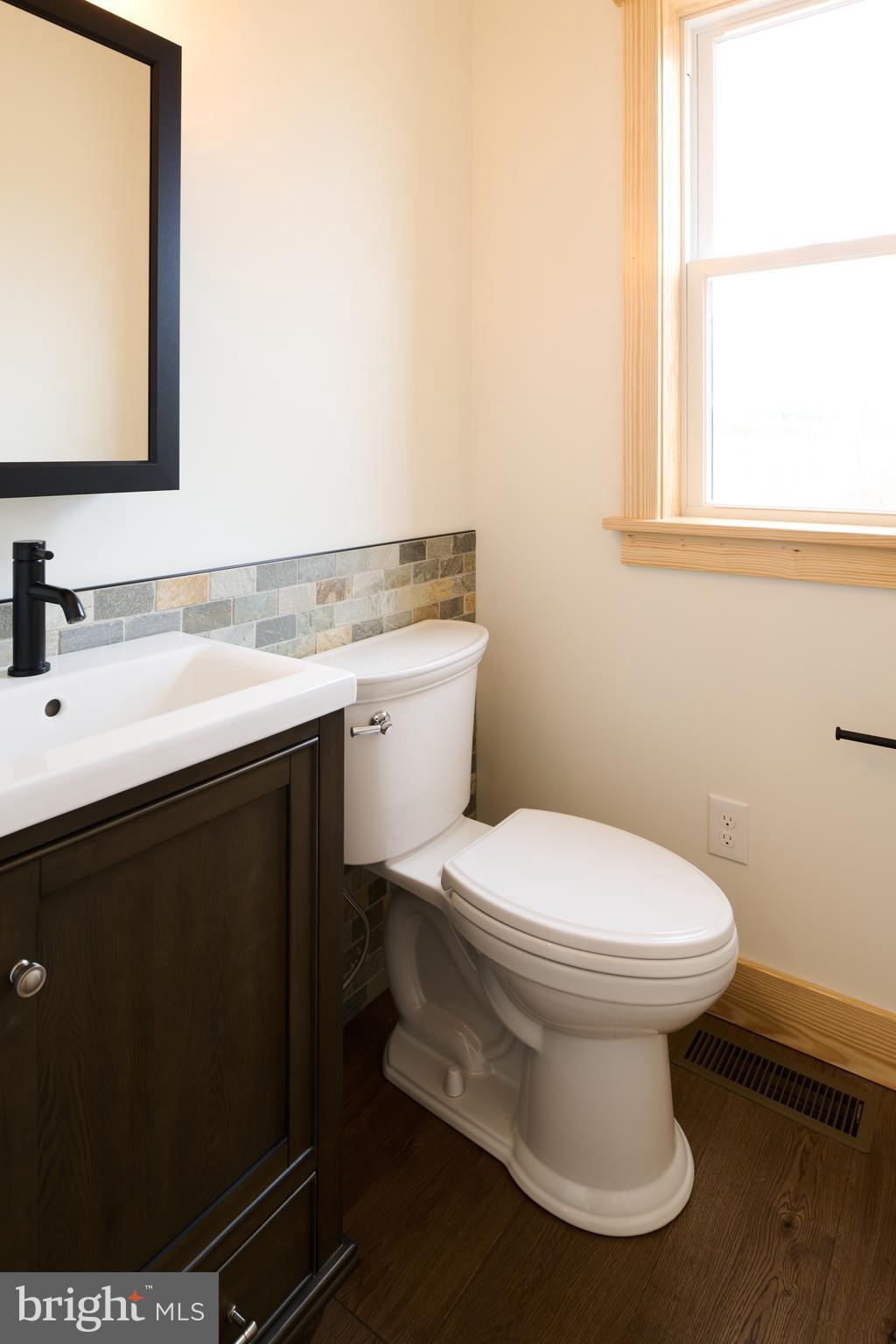 129 Lower Georges Valley Road Spring Mills, PA 16875 - Photo 22 of 61 a bathroom with a sink toilet and mirror