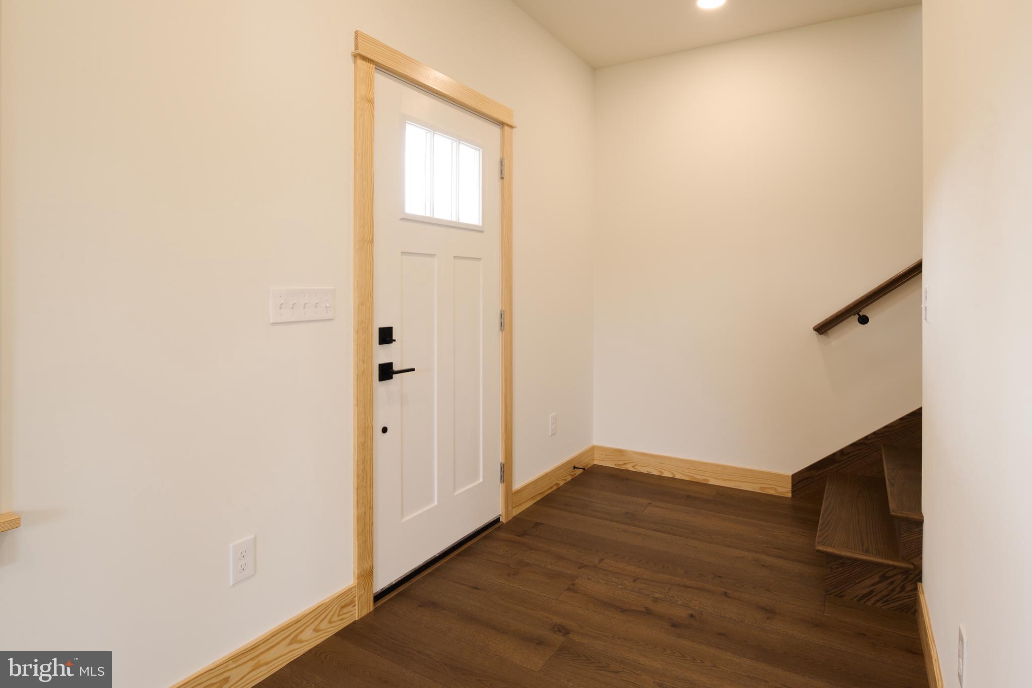 129 Lower Georges Valley Road Spring Mills, PA 16875 - Photo 27 of 61 an empty room with wooden floor