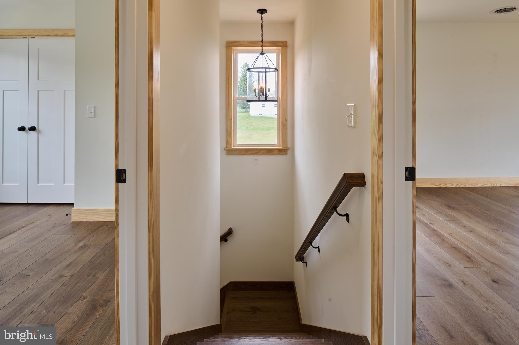 129 Lower Georges Valley Road Spring Mills, PA 16875 - Photo 28 of 61 a view of entryway with wooden floor and stairs