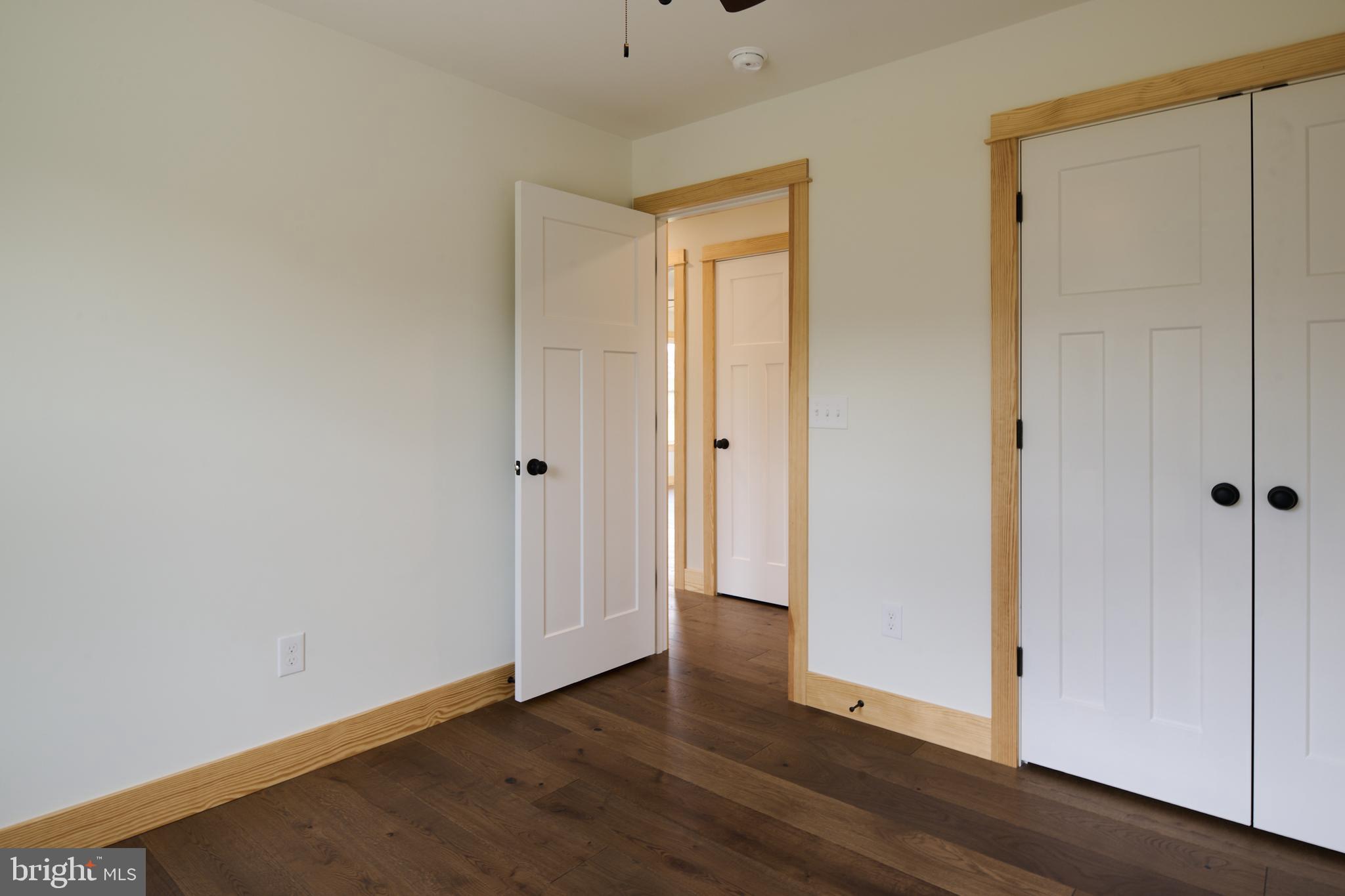 129 Lower Georges Valley Road Spring Mills, PA 16875 - Photo 35 of 61 a view of an empty room and wooden floor