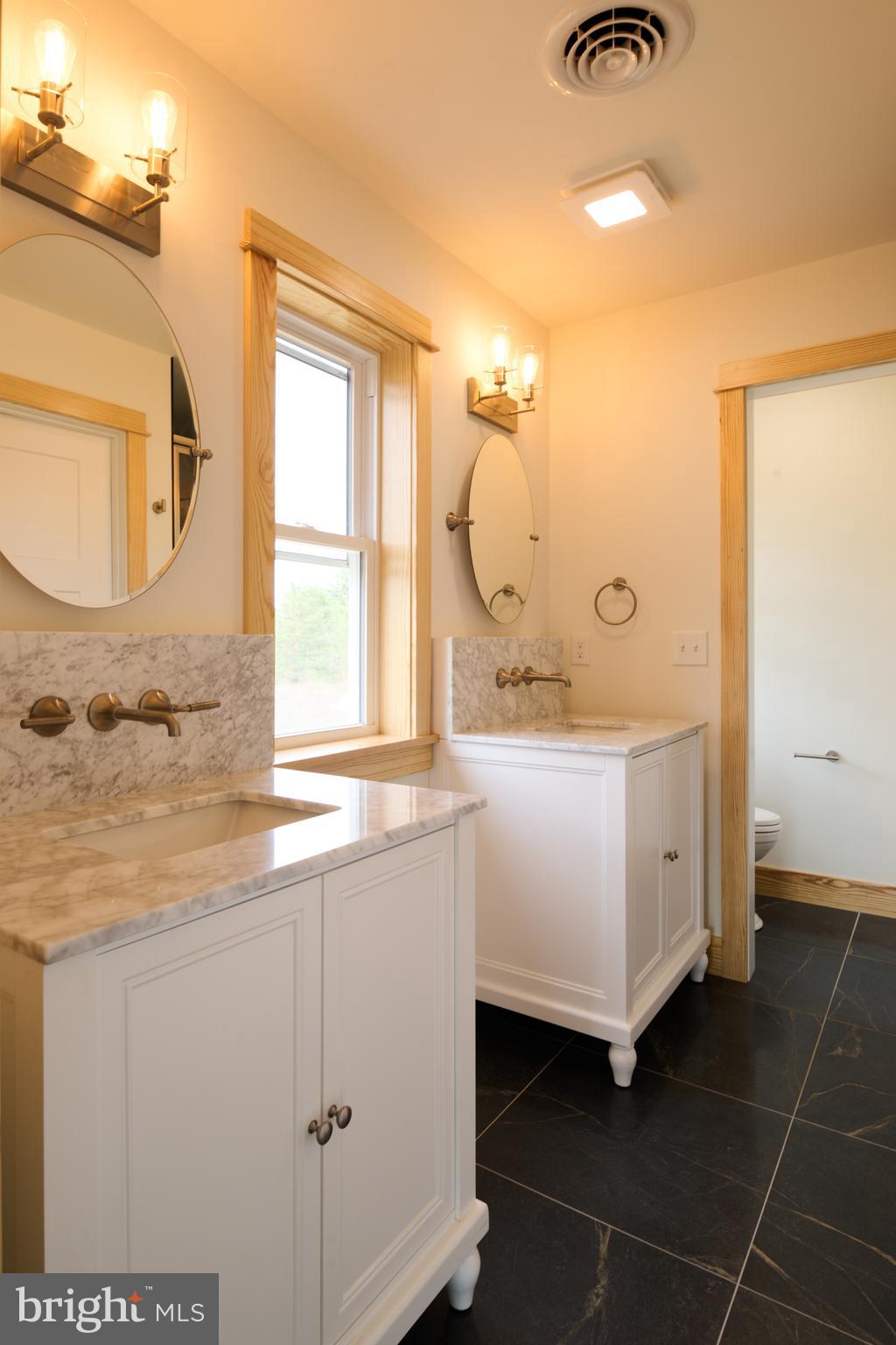 129 Lower Georges Valley Road Spring Mills, PA 16875 - Photo 44 of 61 a bathroom with a double vanity sink mirror and
