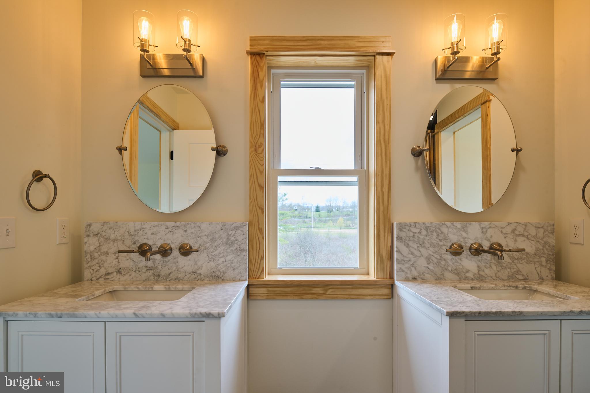 129 Lower Georges Valley Road Spring Mills, PA 16875 - Photo 46 of 61 a bathroom with a granite countertop sink a mirror and a shower