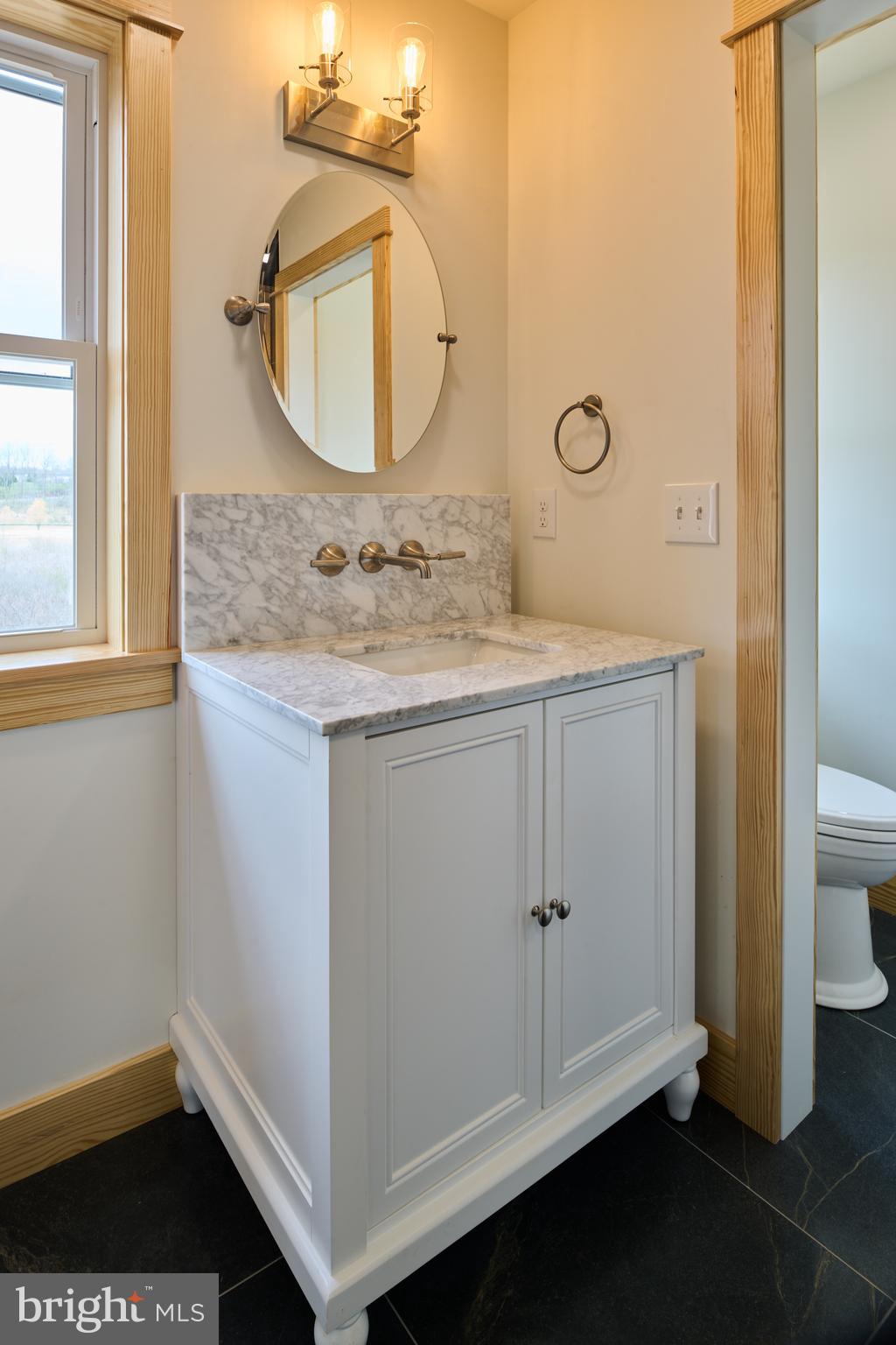 129 Lower Georges Valley Road Spring Mills, PA 16875 - Photo 49 of 61 a bathroom with a sink and a mirror