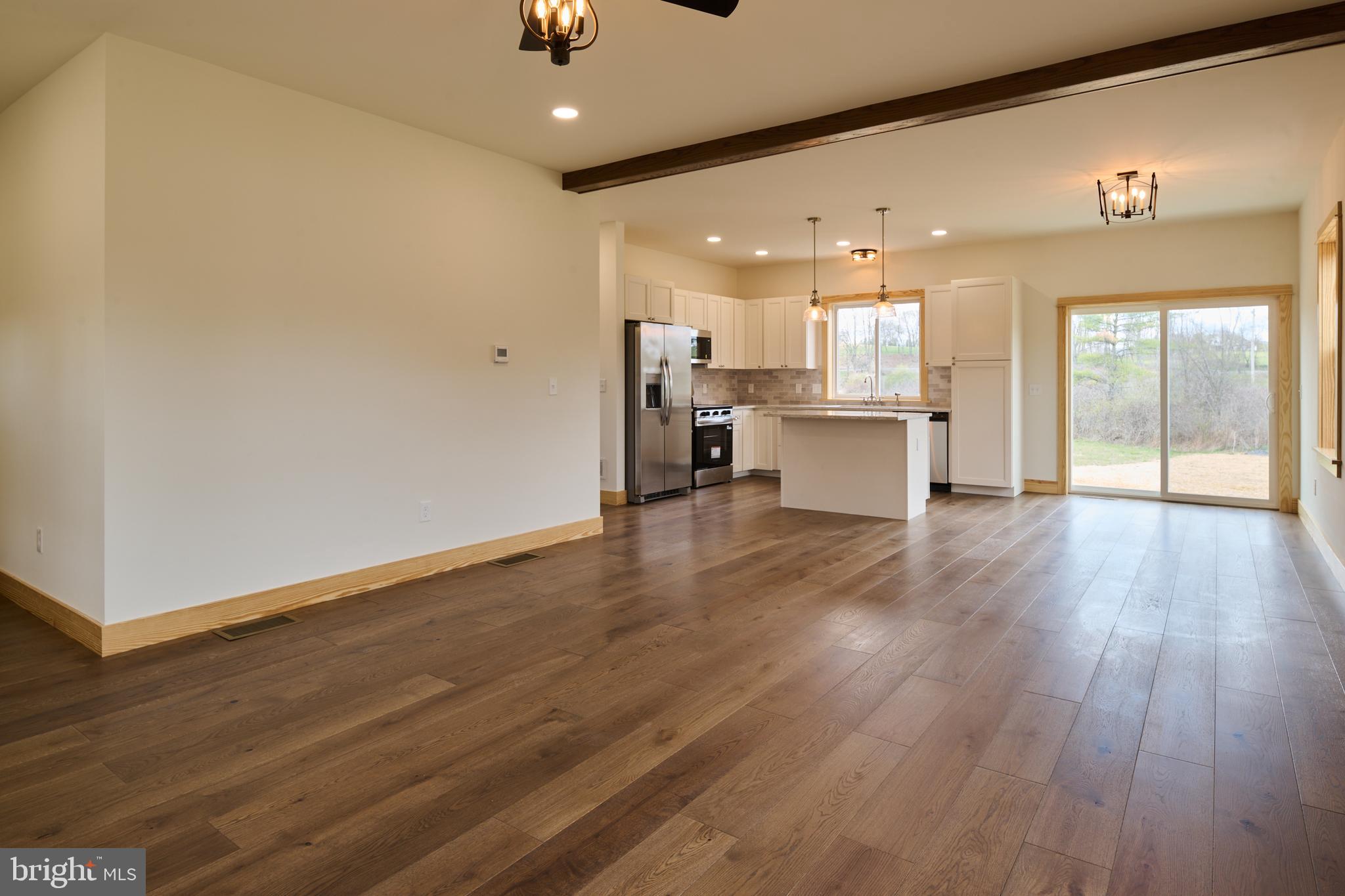 129 Lower Georges Valley Road Spring Mills, PA 16875 - Photo 5 of 61 a view of kitchen with cabinets and wooden floor