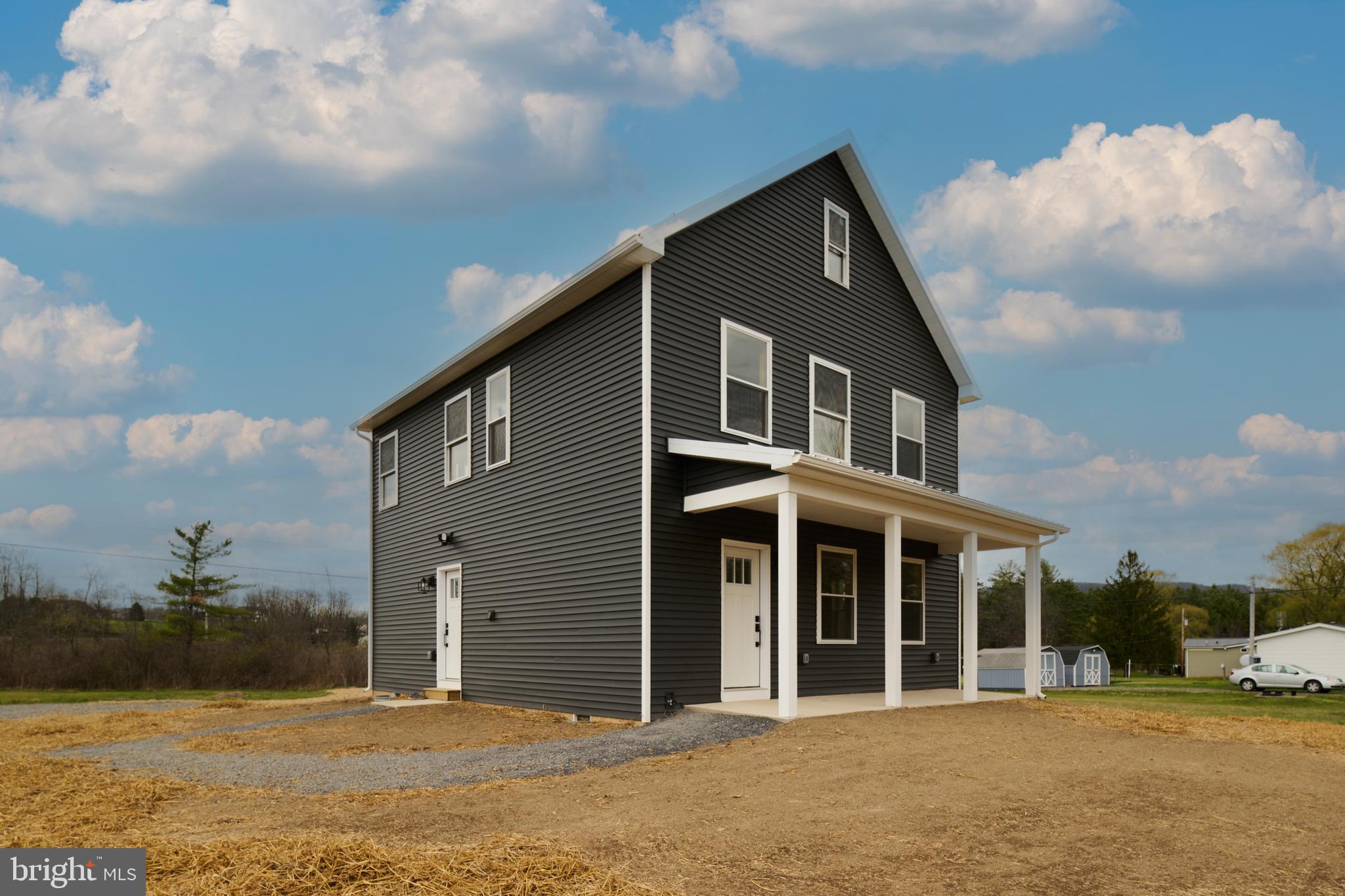 129 Lower Georges Valley Road Spring Mills, PA 16875 - Photo 51 of 61 a front view of a house with a yard