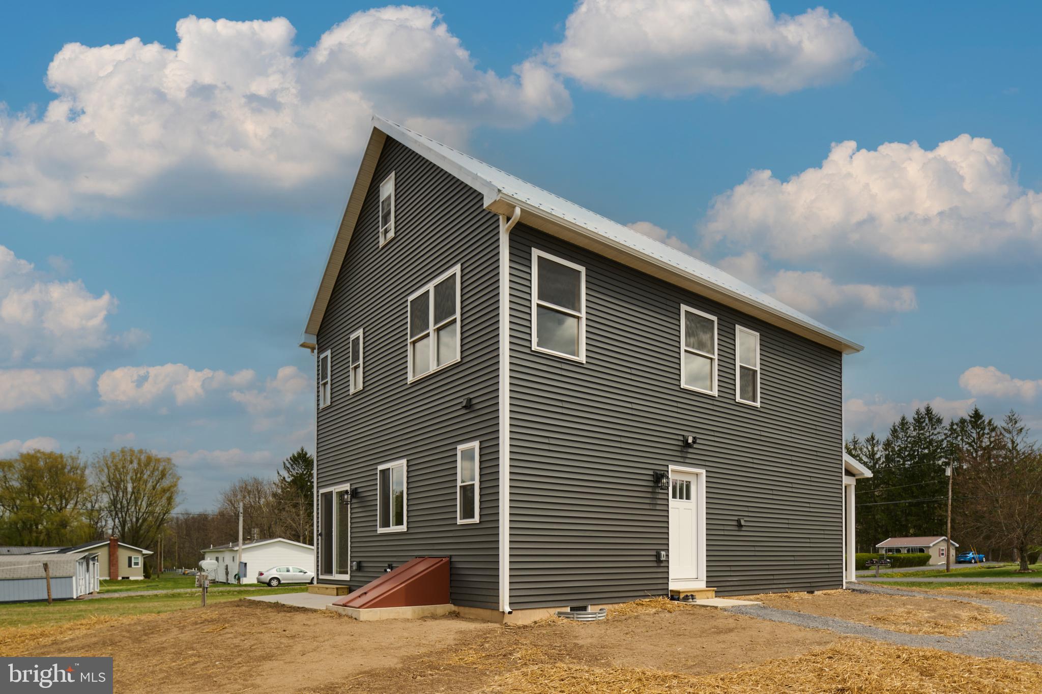 129 Lower Georges Valley Road Spring Mills, PA 16875 - Photo 58 of 61 a front view of a house with a yard