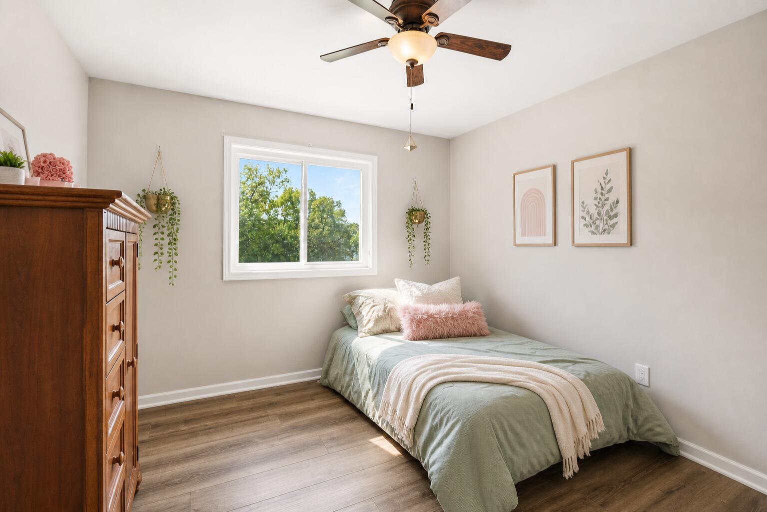 12025 Heron Lake Road St. John, IN 46373 - Photo 24 of 42 a bedroom with a bed and wooden floor