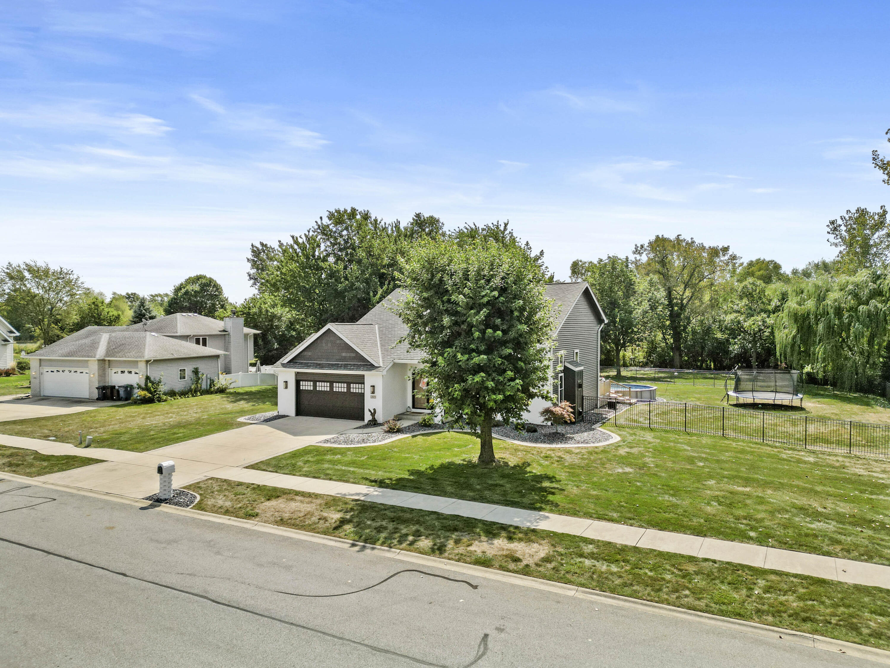 12025 Heron Lake Road St. John, IN 46373 - Photo 3 of 42 front view of a house with a yard