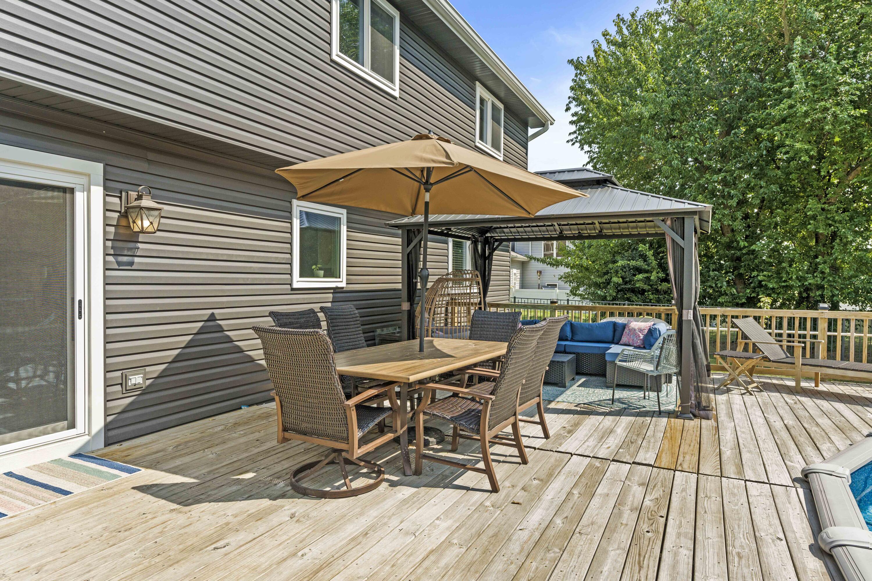 12025 Heron Lake Road St. John, IN 46373 - Photo 33 of 42 a view of a chairs and table on the deck