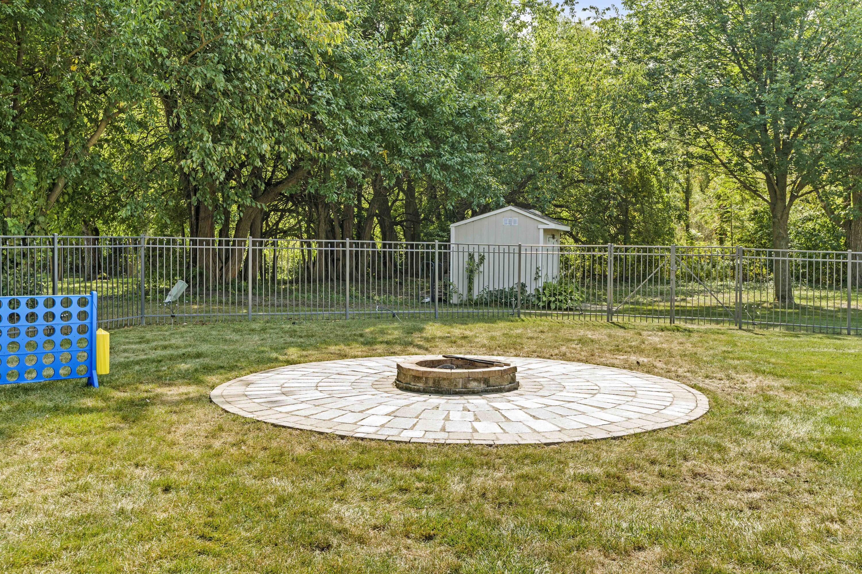 12025 Heron Lake Road St. John, IN 46373 - Photo 35 of 42 a view of a swimming pool with a patio and a yard