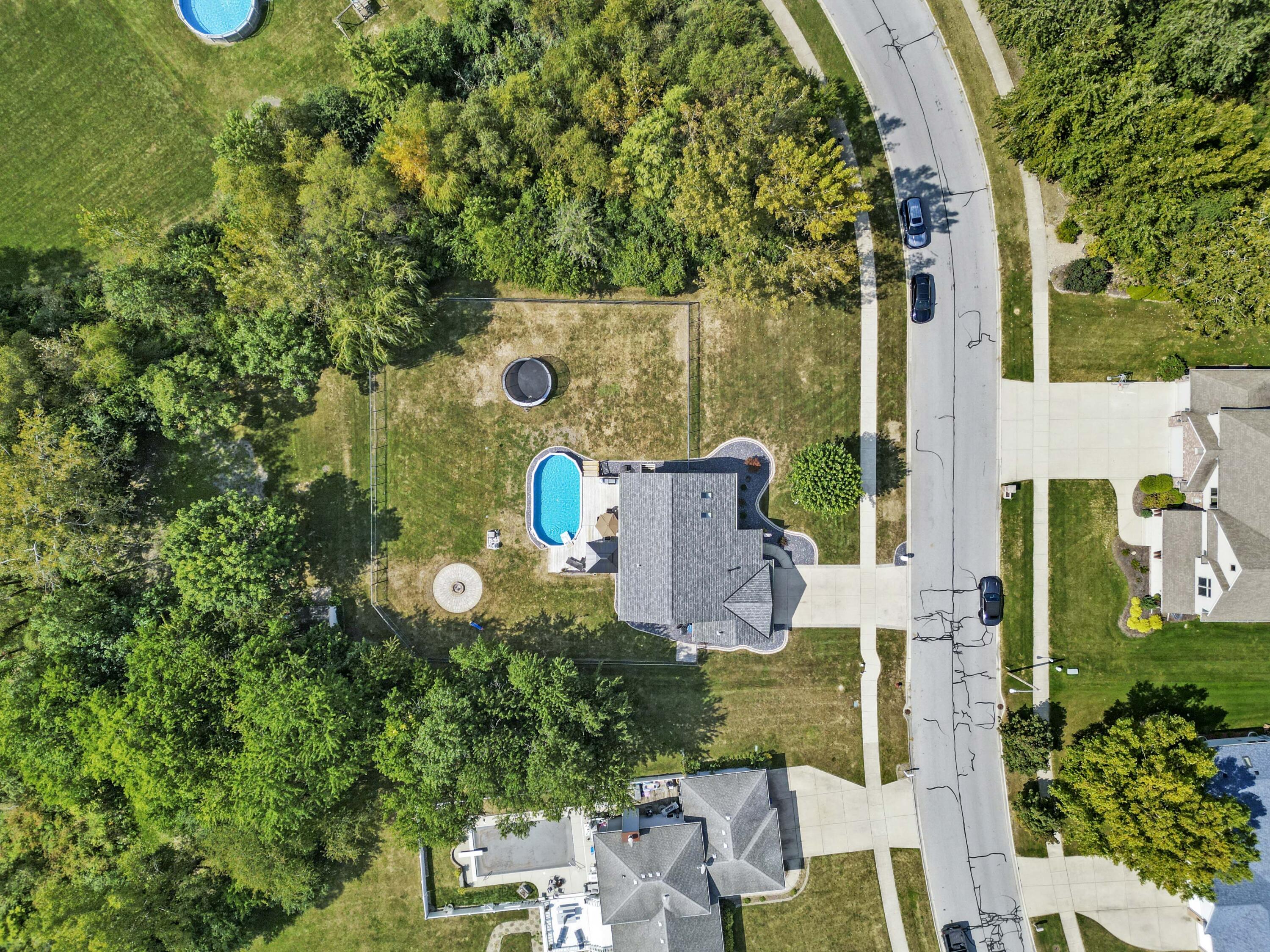 12025 Heron Lake Road St. John, IN 46373 - Photo 38 of 42 an aerial view of a house with outdoor space