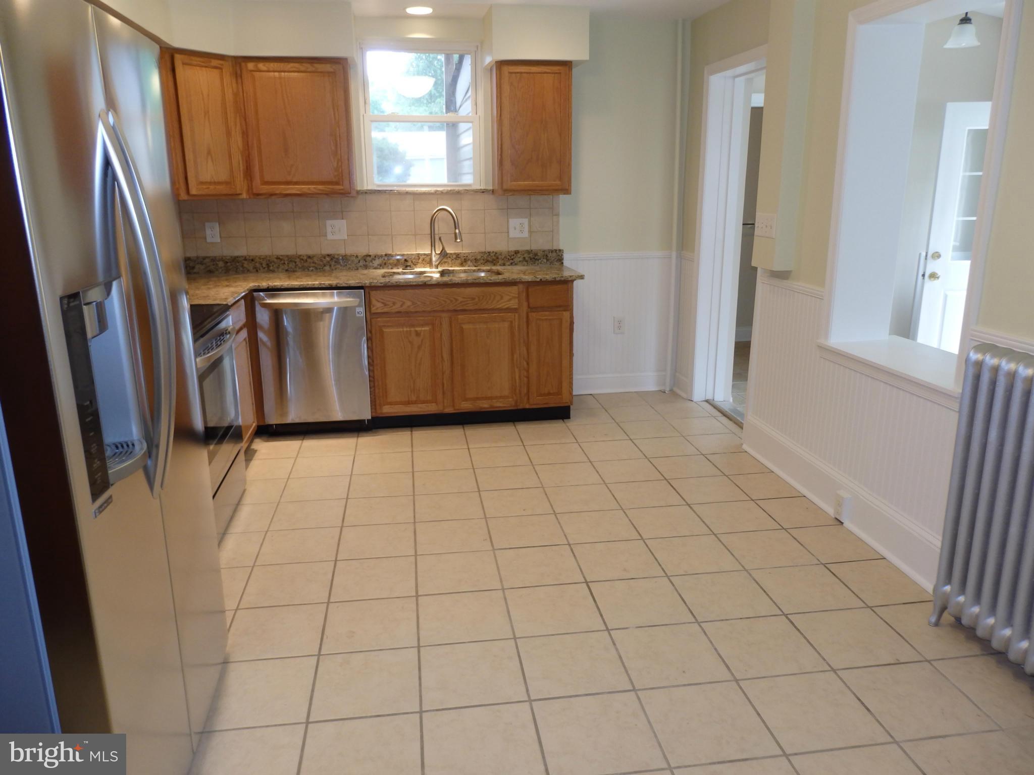 206 Center Street Frederick, MD 21701 - Photo 7 of 30 Kitchen pass-through to Morning Room