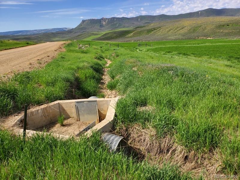 45 County Road Hamilton, CO 81638 - Photo 4 of 11 a view of a grassy area with an ocean view