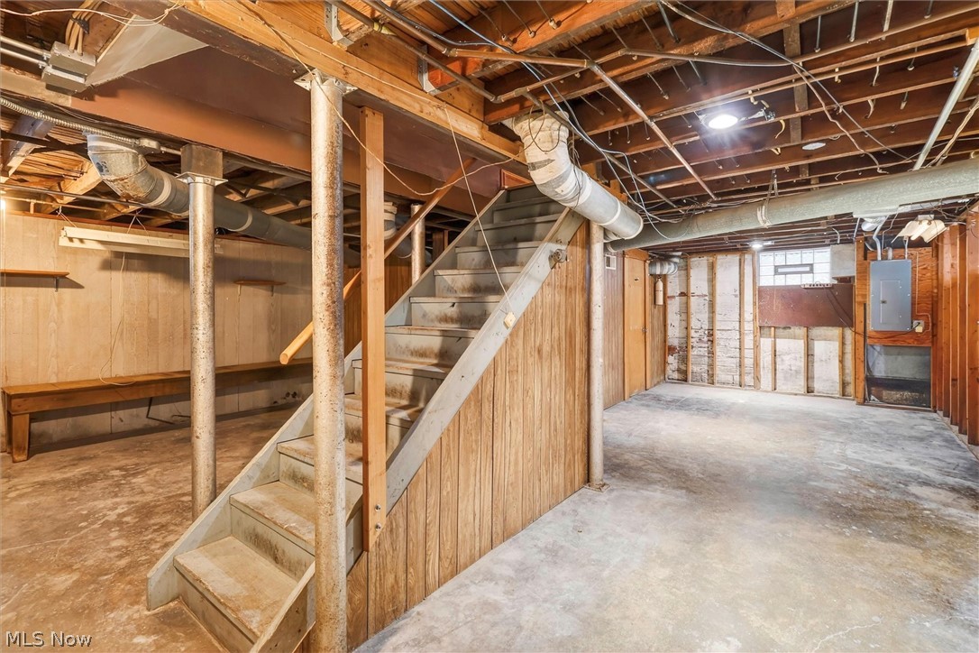 1798 Middlehurst Road Cleveland, OH 44118 - Photo 41 of 49 Basement with electric panel and wood walls